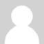 Anonymous user profile icon, silhouette on gray background.